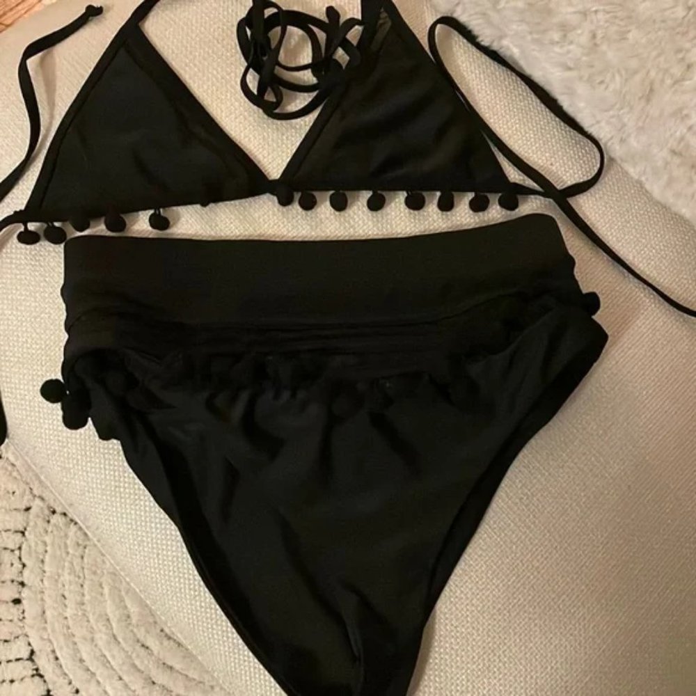 Tularosa black medium bikini top and small bottom.